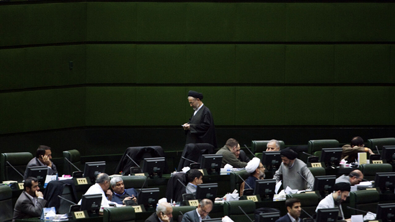 IRAN/ EDITORS' NOTE: Reuters and other foreign media are subject to Iranian restrictions on their ability to film or take pictures in Tehran.
Lawmakers attend a parliament session in Tehran January 29, 2012. REUTERS/Raheb Homavandi (IRAN - Tags: POLITICS) - RTR2X0YQ