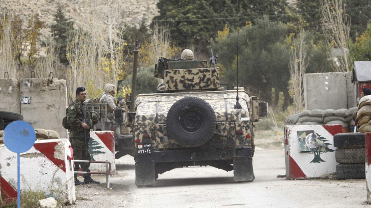 SYRIA-LEBANON/ARMY Lebanese military soldiers man a checkpoint, near the site of an ambush where gunmen killed at least six Lebanese soldiers, in the mountainous border town of Ras Baalbek December 3, 2014. Gunmen killed at least six Lebanese soldiers when they attacked an army patrol near the border with Syria on Tuesday, the army and a Lebanese security source said. The source said the gunmen crossed from Syria to the mountainous border town of Ras Baalbek after dark and ambushed the patrol. Clashes between gunmen and a spe