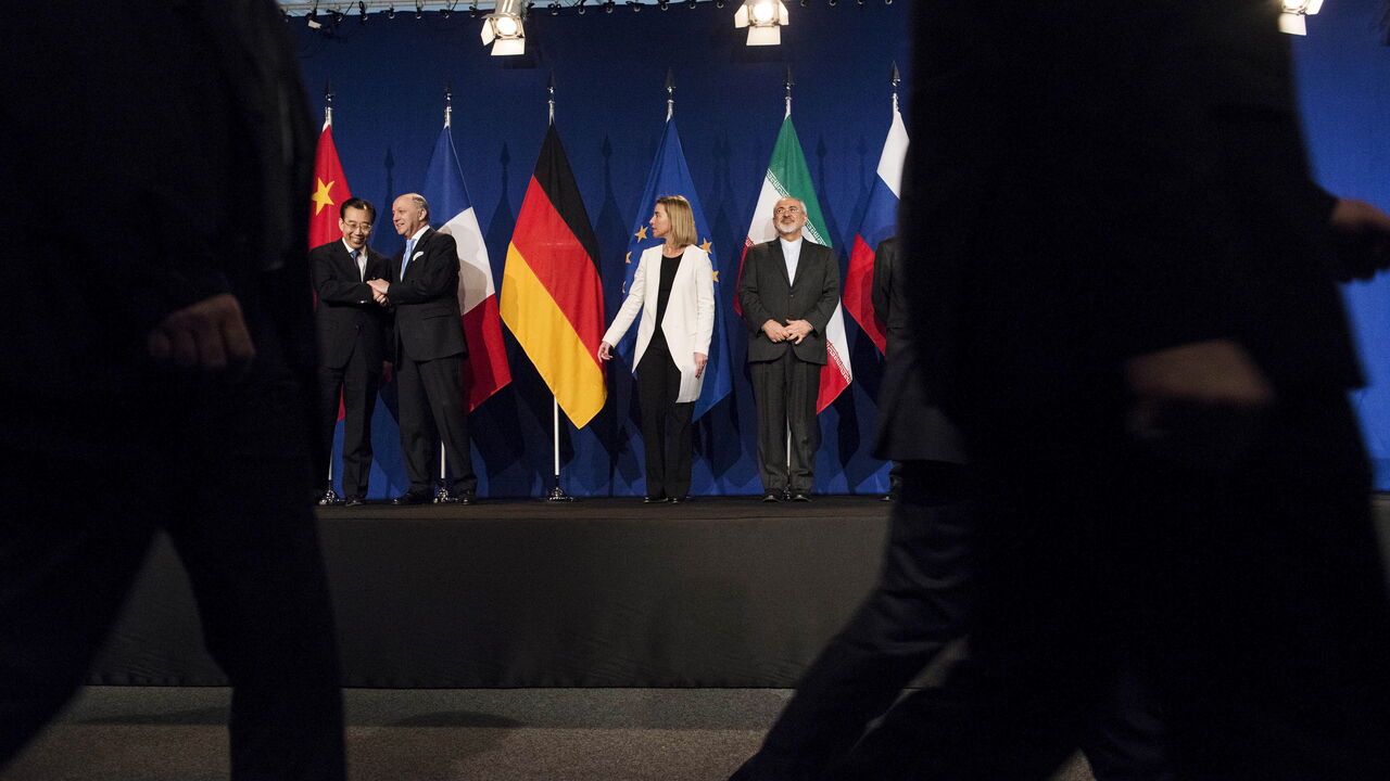 (L-R) Chinese Ambassador to the United Nations Wu Hailong, French Foreign Minister Laurent Fabius, European Union High Representative Federica Mogherini and Iranian Foreign Minister Javad Zarifat arrive to deliver statements following nuclear talks at the Swiss Federal Institute of Technology in Lausanne (Ecole Polytechnique Federale De Lausanne) April 2, 2015. Iran and world powers reached a framework on curbing Iran's nuclear programme at marathon talks in Switzerland on Thursday that will allow further n