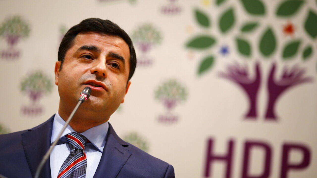 TURKEY-POLITICS/ Selahattin Demirtas, co-chairman of the pro-Kurdish Peoples' Democracy Party (HDP), addresses his party members as he starts his campaign for Turkey's June 7 parliamentary elections, during a meeting in Ankara April 10, 2015. REUTERS/Umit Bektas - RTR4WSQ9