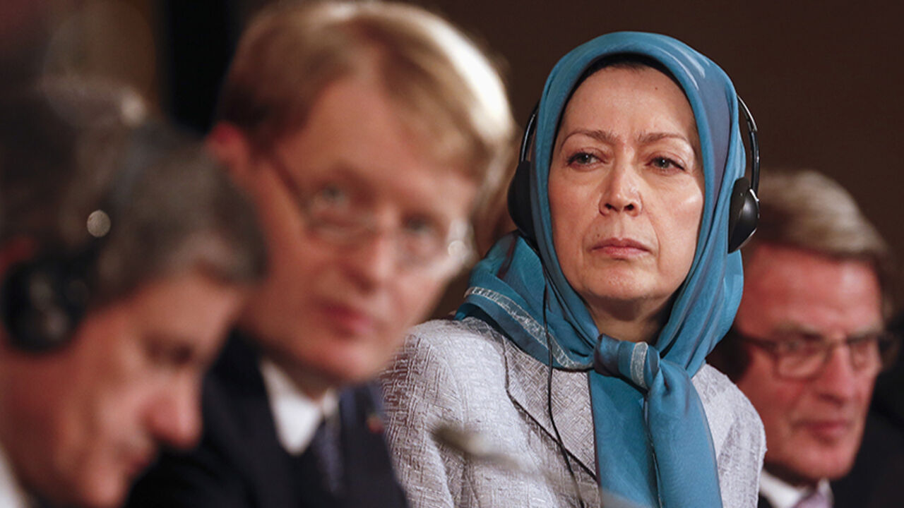 Maryam Rajavi (2nd R), president-elect of the National Council of Resistance of Iran, attends an international meeting in Rome December 19, 2013. The meeting organised by the Italian committee of parliamentarians and pro-democracy Iranian activists was held to discuss the nuclear talks in Geneva, organisers said. REUTERS/Alessandro  Bianchi (ITALY - Tags: POLITICS) - RTX16ORH