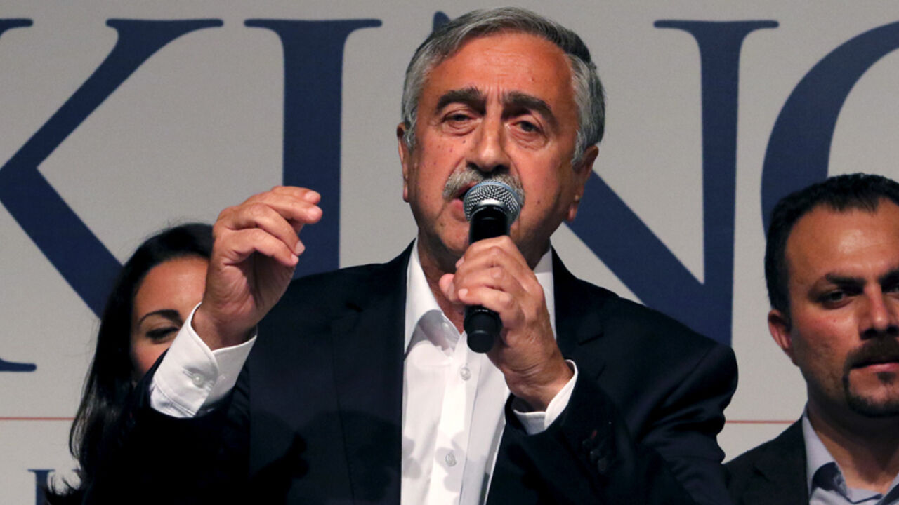 CYPRUS-NORTH/ELECTION Turkish Cypriot politician Mustafa Akinci delivers a speech to supporters after his election victory in Nicosia, April 26, 2015. Mustafa Akinci, standing as an independent, won 60.3 percent of the votes, according to figures provided by the election commission. His rival was incumbent president Dervis Eroglu, a conservative elected five years ago. REUTERS/Yiannis Kourtoglou - RTX1ADHX