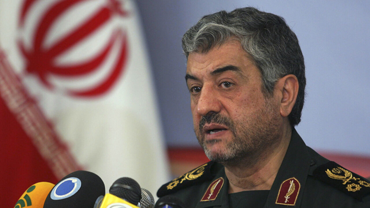EDITORS' NOTE: Reuters and other foreign media are subject to Iranian restrictions on their ability to film or take pictures in Tehran.

Mohammad Ali Jafari, commander of the Islamic Revolutionary Guard Corp, attends a news conference in Tehran February 7, 2011. REUTERS/STRINGER (IRAN - Tags: POLITICS MILITARY) - RTXXKFA