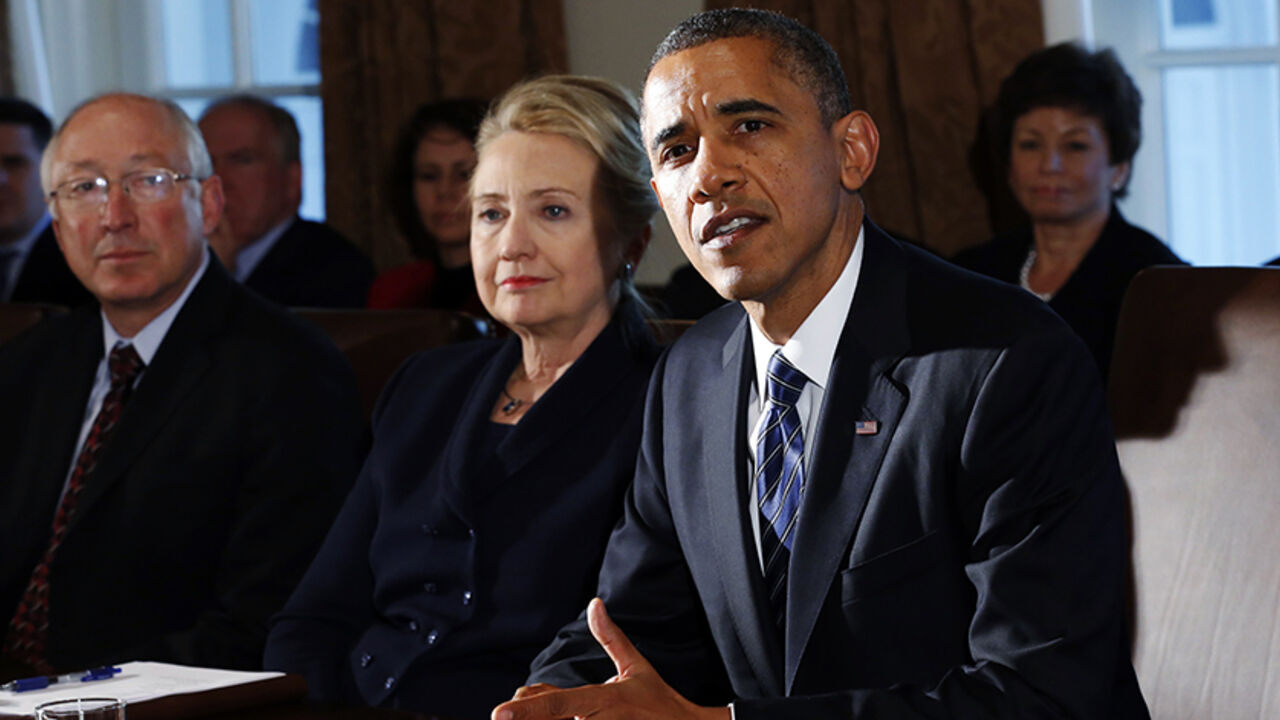 USA-OBAMA/FISCAL U.S. President Barack Obama (R) speaks during a meeting with members of his cabinet at the White House in Washington November 28, 2012. Obama said on Wednesday he hopes he can reach agreement with the U.S. Congress before Christmas to avoid the looming "fiscal cliff" and shrink the budget deficit, and urged supporters to pressure lawmakers via Twitter and other social media.
REUTERS/Kevin Lamarque (UNITED STATES - Tags: POLITICS BUSINESS) - RTR3AZPA