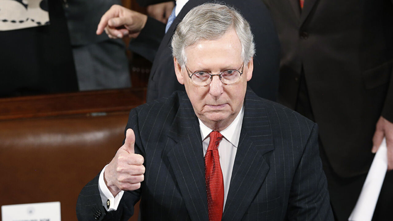 USA-JAPAN/ U.S. Senate Majority Leader Mitch McConnell (R-KY) gestures to to a colleague before the start of
Japanese Prime Minister Shinzo Abe's address a joint meeting of the U.S. Congress on Capitol Hill in Washington, April 29, 2015. McConnell and Abe were scheduled to meet later in the day. REUTERS/Jonathan Ernst - RTX1AUYN