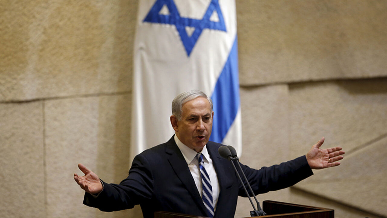Israel's Prime Minister Benjamin Netanyahu addresses the plenum at Israel's parliament in Jerusalem May 4, 2015. Israeli Foreign Minister Avigdor Lieberman said on Monday he would not join the new coalition government being formed by Netanyahu, citing disputes over legislation. REUTERS/Ronen Zvulun  - RTX1BHTM