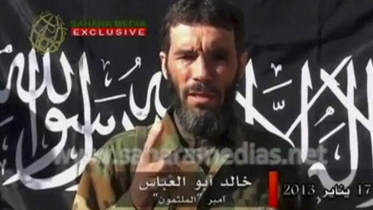 SAHARA-CRISIS Veteran jihadist Mokhtar Belmokhtar speaks in this undated still image taken from a video released by Sahara Media on January 21, 2013. Belmokhtar has claimed responsibility in the name of al Qaeda for the Algerian hostage-taking, and his Mulathameen Brigade warned it would carry out further attacks on foreign interests unless the fighting in Mali stopped Mauritanian news website Sahara Media said on January 20. REUTERS/Sahara Media via Reuters TV (ALGERIA - Tags: CIVIL UNREST CONFLICT TPX IMAGES OF THE DA