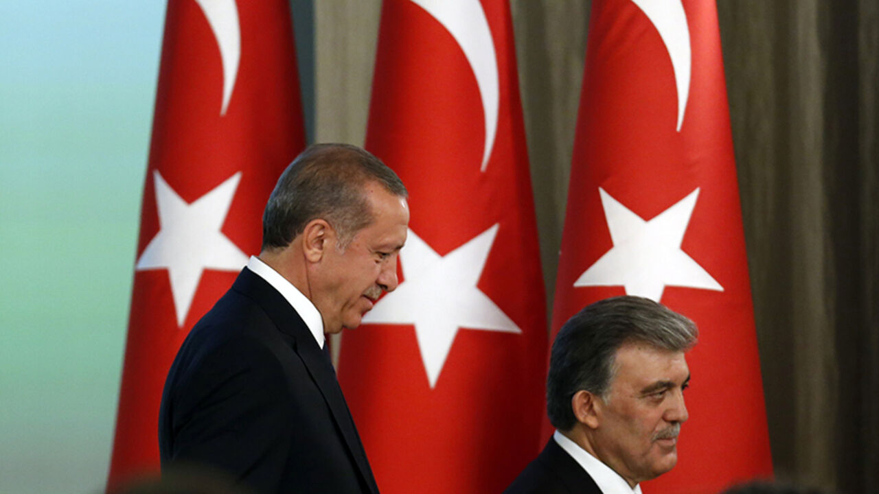 TURKEY-ERDOGAN/PRESIDENT Turkey's new President Tayyip Erdogan (L) and outgoing President Abdullah Gul attend a handover ceremony at the Presidential Palace of Cankaya in Ankara August 28, 2014. Erdogan was sworn in as Turkey's 12th president at a ceremony in parliament on Thursday, cementing his position as the country's most powerful modern leader, in what his opponents fear will herald an increasingly authoritarian rule. REUTERS/Umit Bektas (TURKEY - Tags: POLITICS) - RTR444T5