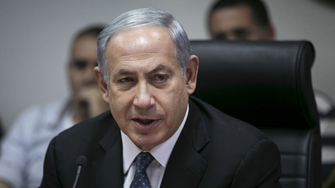 Israel's Prime Minister Benjamin Netanyahu attends a briefing at the Israeli army's Home Front Command base in Ramle near Tel Aviv, Israel June 2, 2015. Israel launched a five-day annual home front defence exercise on Sunday, preparing soldiers and civilians for missile attacks. REUTERS/Baz Ratner  - RTR4YIVS