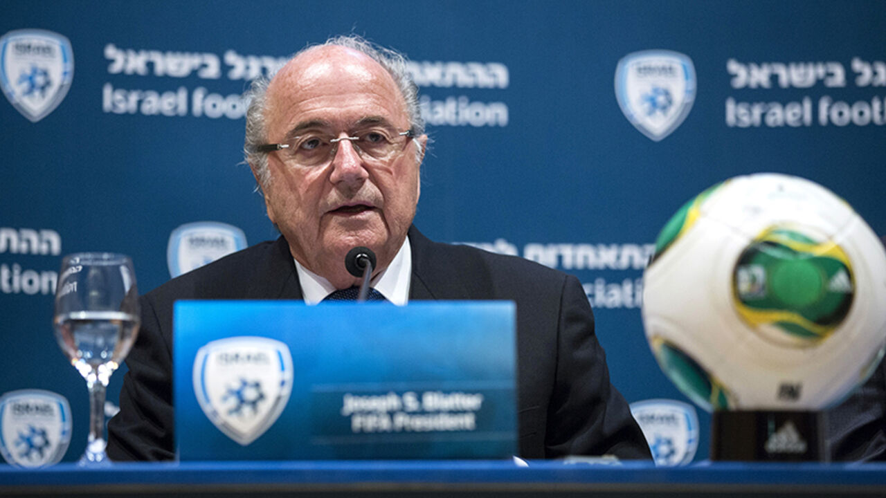 SOCCER-ISRAEL/PALESTINIANS FIFA President Sepp Blatter speaks during a joint news conference with Avi Luzon, Israeli Football Association Chairman (not pictured), in Jerusalem July 9, 2013. Blatter will establish a task force to address Palestinian concerns over travel restrictions for soccer players and officials through border crossings controlled by Israel, he said on Tuesday. REUTER/Baz Ratner (JERUSALEM - Tags: POLITICS SPORT SOCCER) - RTX11HMA