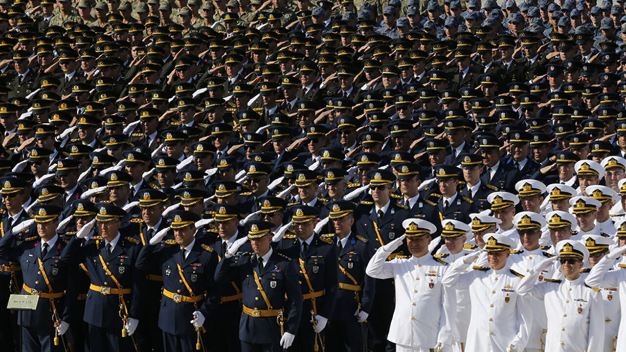 Turkish soldiers salute during a ceremony marking the 91st anniversary of Victory Day at the mausoleum of Mustafa Kemal Ataturk, founder of modern Turkey, in Ankara August 30, 2013. REUTERS/Umit Bektas (TURKEY - Tags: POLITICS MILITARY) - RTX131DP