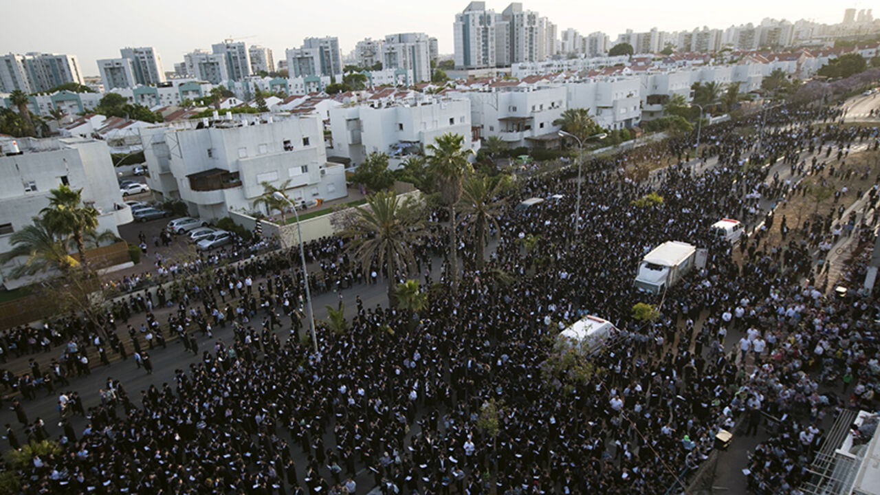 ISRAEL-RELIGION/ Ultra-Orthodox Jews take part in a protest against a shopping centre, which opens on Saturdays, near their neighbourhood, in the southern city of Ashdod May 18, 2015. About 10,000 protesters took part in the protest. REUTERS/Amir Cohen
- RTX1DJBK