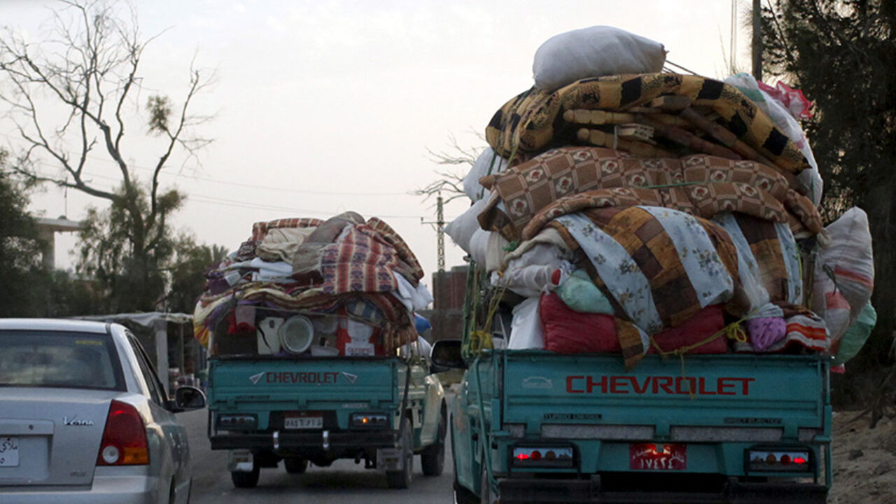 SINAI-SECURITY/EGYPT Pickup trucks filled with personal belongings, leave the border areas in northern Sinai, where authorities are battling insurgents on the high way between Al-Arish and the border town of Rafah, Egypt, May 25, 2015. Authorities in the Sinai Peninsula are battling insurgents who support Islamic State, the militant group that has seized parts of Iraq, Syria and Libya. The Sinai conflict, which has has displaced hundreds of Egyptians, is the biggest security challenge for President Abdel Fattah al-Sisi, who has