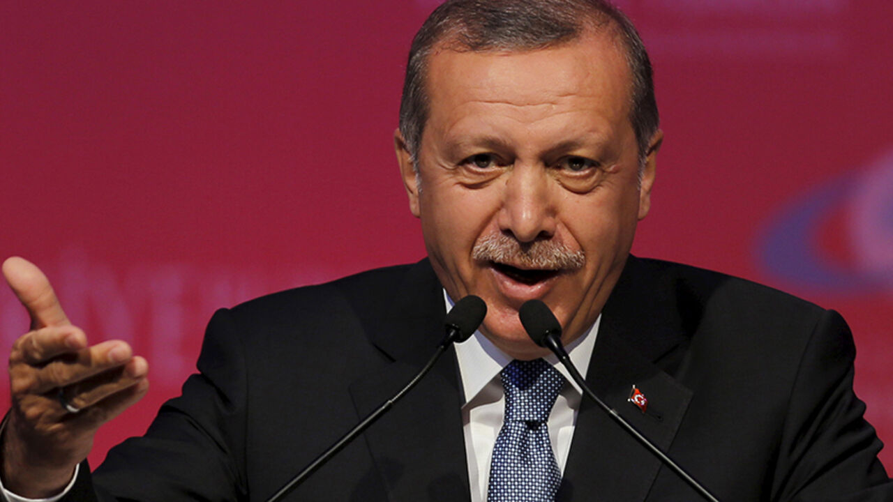 TURKEY-POLITICS/ERDOGAN Turkey's President Tayyip Erdogan makes a speech during a graduation ceremony in Ankara, Turkey, June 11, 2015. President Erdogan on Thursday urged the country's political parties to work quickly to form a new government, saying egos should be left aside and that history would judge anyone who left Turkey in limbo. In his first public appearance since Sunday's parliamentary election, Erdogan said no political development should be allowed to threaten Turkey's gains. He said he would do his part in finding a