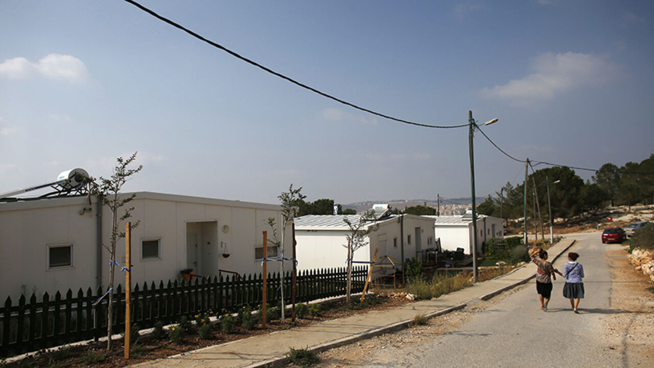PALESTINIANS-ISRAEL/SETTLEMENT Israeli women walk in a Jewish settlement known as "Gevaot", in the Etzion settlement bloc, near Bethlehem August 31, 2014. Israel announced on Sunday a land appropriation in the occupied West Bank that an anti-settlement group termed the biggest in 30 years and a Palestinian official said would cause only more friction after the Gaza war. Some 400 hectares (988 acres) in the Etzion settlement bloc near Bethlehem were declared "state land, on the instructions of the political echelon" by the military-run Ci