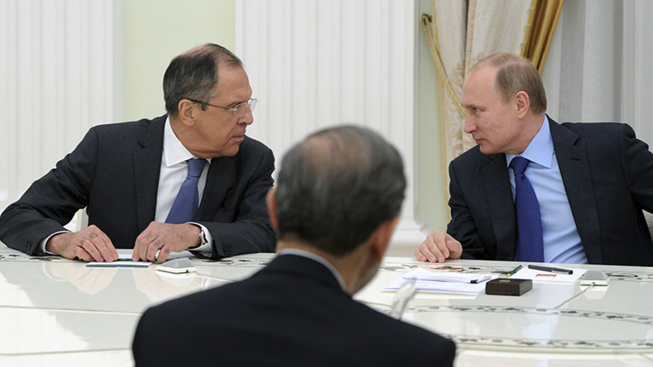 RUSSIA-CRISIS/IRAN Russia's President Vladimir Putin (R) and Foreign Minister Sergei Lavrov (L) attend a meeting with Ali Akbar Velayati, a special envoy of the Iranian president, at the Kremlin in Moscow January 28, 2015. Putin, along with Energy Minister Alexander Novak and Lavrov, met with the envoy of Iranian President Hassan Rouhani, the Kremlin said in a statement on Wednesday. The Kremlin statement said bilateral relations along with global and regional issues were discussed at the meeting. REUTERS/Mikhail Klimentyev/R