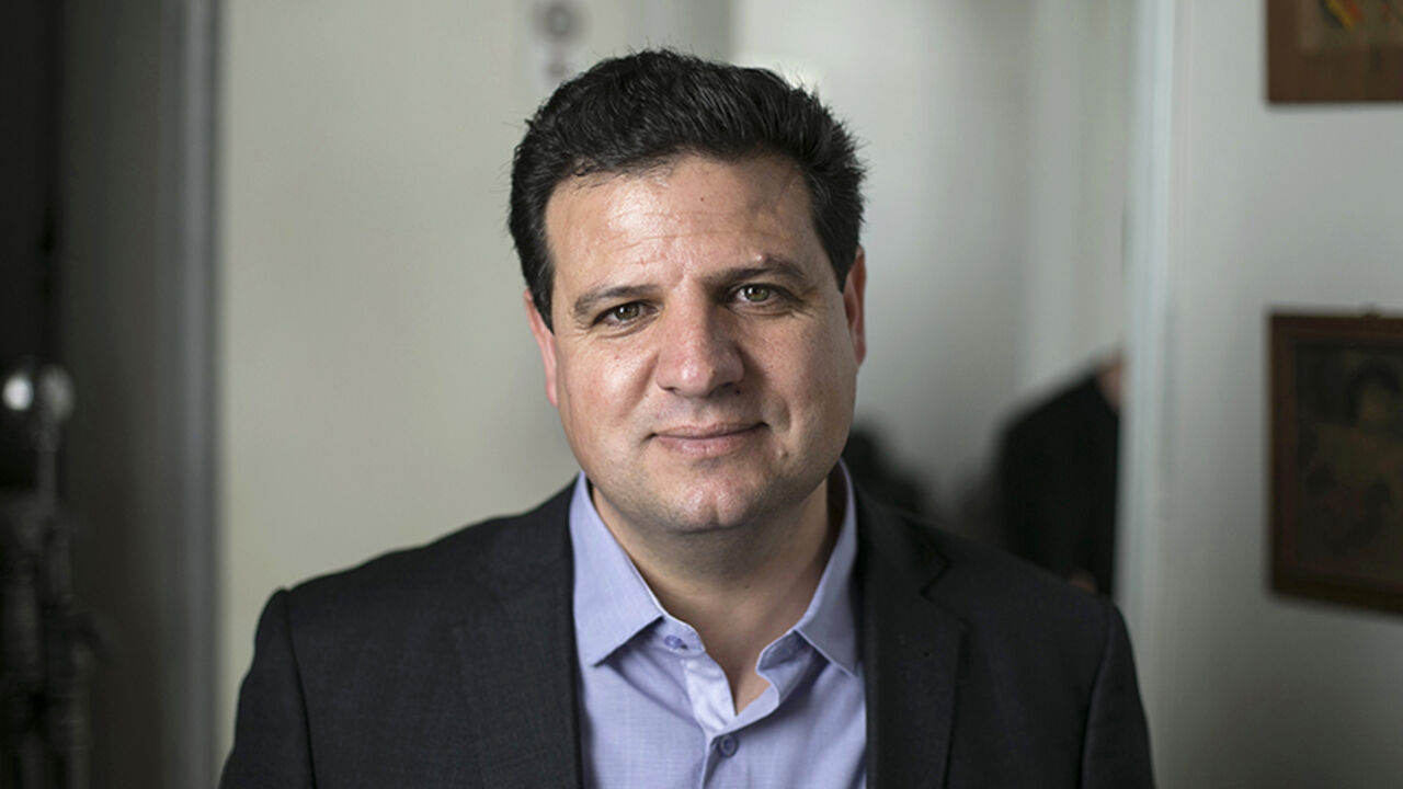 ISRAEL-ELECTION/ARABS Ayman Odeh, head of the Joint Arab List, poses before the filming of a television campaign ad in Tel Aviv, March 8, 2015. A political sideshow for much of the past six decades, Israel's Arab minority is hoping to gain much-needed muscle after next week's parliamentary election, with four Arab parties uniting under one banner for the first time. Surveys show the Joint Arab List could even finish third in the vote and become a factor in the coalition-building that dominates Israeli politics, where no party ha