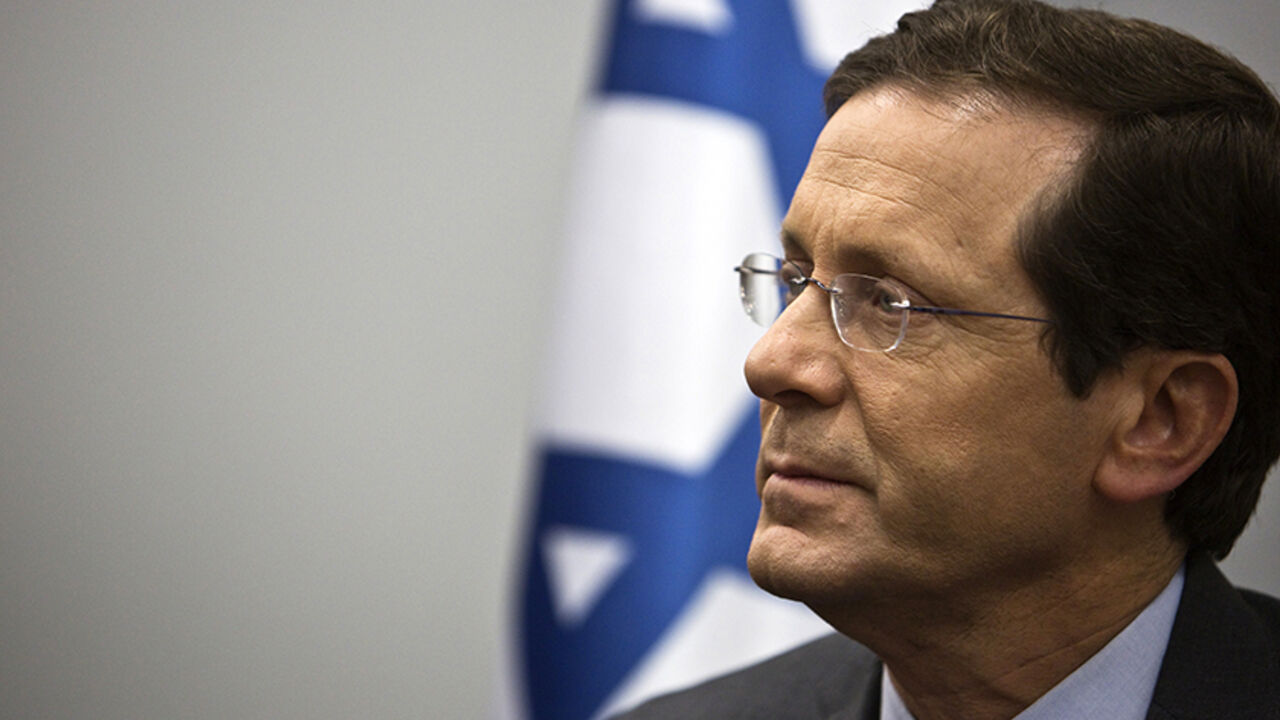 ISRAEL-ELECTION/ Isaac Herzog, co-leader of the centre-left Zionist Union party, is seen at his party's headquarters in Tel Aviv March 16, 2015. Israel's Prime Minister Benjamin Netanyahu, in a final bid to shore up right-wing support ahead of a knife-edge vote on Tuesday, said he would not permit a Palestinian state to be created under his watch if he is re-elected. Herzog favors reviving peace talks with U.S.-backed Palestinian President Mahmoud Abbas. REUTERS/Nir Elias (ISRAEL - Tags: POLITICS ELECTIONS) - RTR4TKZ6