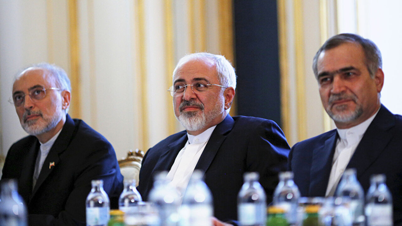 IRAN-NUCLEAR/ Iranian Foreign Minister Mohammad Javad Zarif (C), Head of the Iranian Atomic Energy Organization Ali Akbar Salehi and Hossein Fereydoon (R), brother and close aide to President Hassan Rouhani meet with U.S. Secretary of State John Kerry (not pictured) at a hotel in Vienna, Austria July 3, 2015. A year and half of nuclear talks between Iran and major powers were creeping towards the finish line on Friday as negotiators wrestled with sticking points including questions about Tehran's past atomic research. R