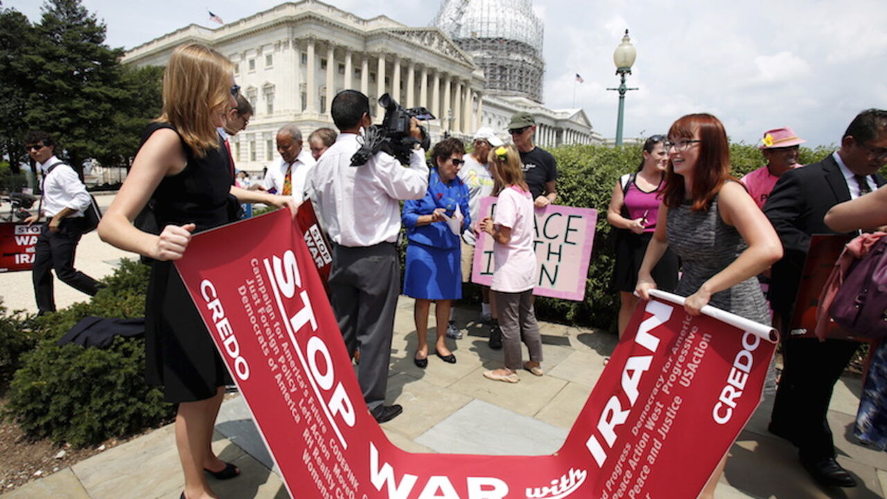 IRAN-NUCLEAR/CONGRESS Activists prepare to leave after delivering more than 400,000 petition signatures to Capitol Hill in support of the Iran nuclear deal in Washington July 29, 2015. Secretary of State John Kerry intensified efforts on Tuesday to beat back criticism of the Iran nuclear deal and convince U.S. lawmakers that rejecting it would give Tehran a fast track to a weapon and access to billions of dollars from collapsed sanctions. REUTERS/Yuri Gripas - RTX1MAT0