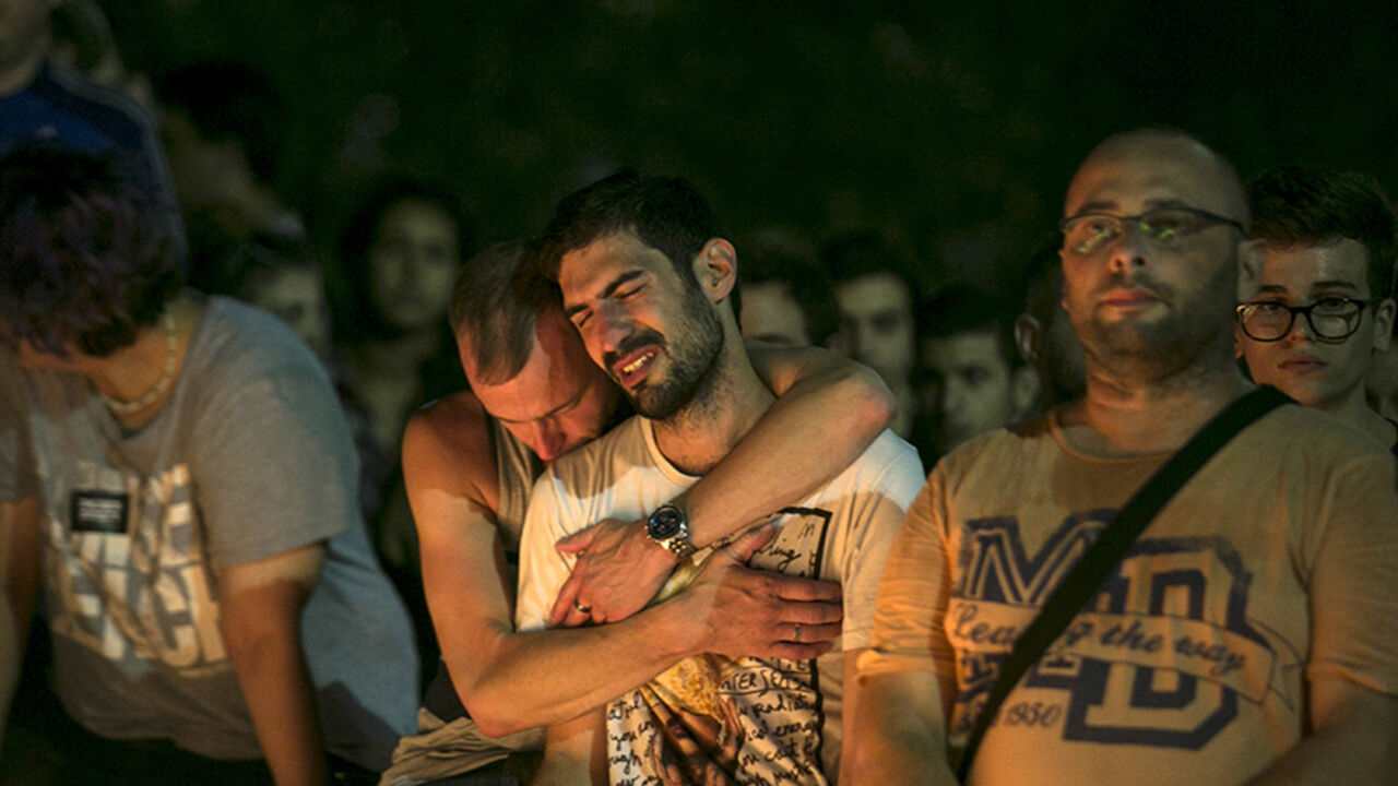 ISRAEL-GAY/ People react during a candlelight vigil in Tel Aviv, Israel, for Shira Banki, who died on Sunday of stab wounds sustained when an ultra-Orthodox man with a knife attacked a Gay Pride parade in Jerusalem three days ago, August 2, 2015. High school student Banki, 16, was one of six people wounded in the assault. Her death highlighted the city's sharp social divisions between Orthodox and secular Jews. REUTERS/Baz Ratner - RTX1MRMX