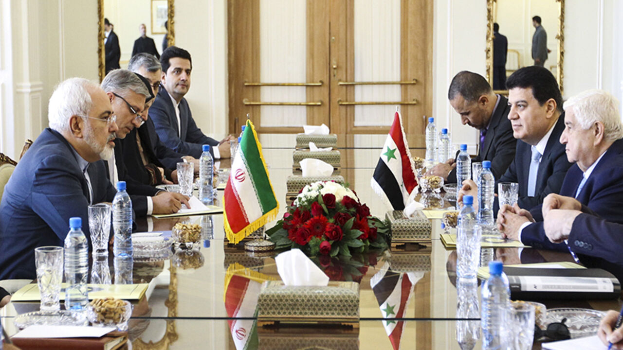 SYRIA-CRISIS/IRAN-VISIT Iranian Foreign Minister Mohammad Javad Zarif (L) and his Syrian counterpart Walid al-Moualem (3rd R) hold a meeting in Tehran August 5, 2015. Syrian Foreign Minister Walid al-Moualem arrived in Tehran on Tuesday for talks with officials from allies Iran and Russia that are expected to focus on efforts to end the civil war in his country. REUTERS/Raheb Homavandi/TIMA ATTENTION EDITORS - THIS PICTURE WAS PROVIDED BY A THIRD PARTY. REUTERS IS UNABLE TO INDEPENDENTLY VERIFY THE AUTHENTICITY, CONTENT, LOCATION