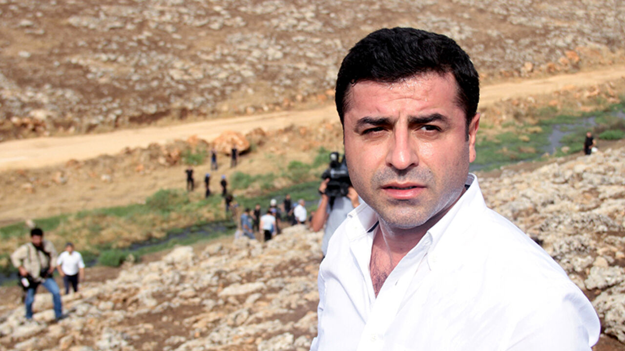 TURKEY-POLITICS/KURDS Co-chairman of the pro-Kurdish Peoples' Democratic Party, Selahattin Demirtas walks with his party members to the southeastern town of Cizre, near Idil in Sirnak province, Turkey, September 10, 2015. Pro-Kurdish politicians, including cabinet ministers, attempted to march to a town in southeast Turkey on Thursday to protest a week-old curfew there, as their party came under fire from President Tayyip Erdogan and from a court investigation of their leader. Conflict between militants of the Kurdistan Workers