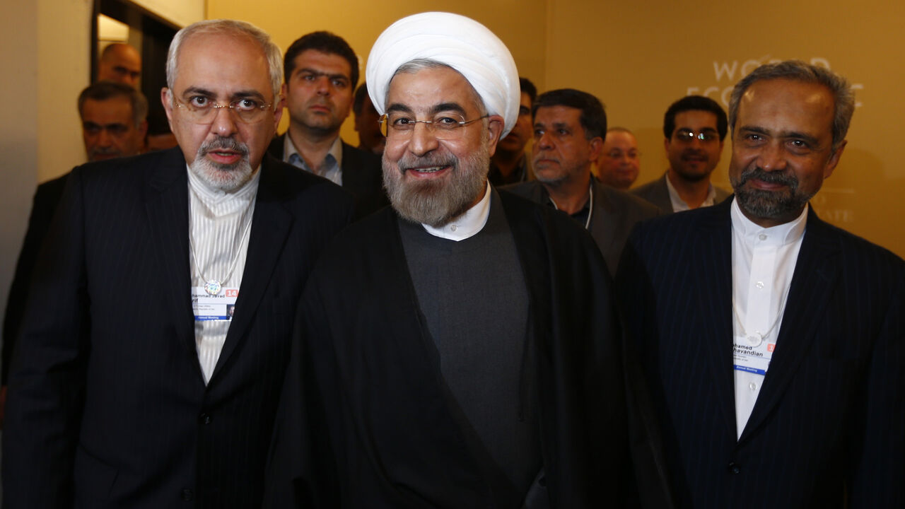 Iran's President Hassan Rouhani, Foreign Minister Mohammad Javad Zarif (L) and Mohammad Nahavandian the Head of Iran Presidential Office (R) arrive for a meeting during the annual meeting of the World Economic Forum (WEF) in Davos January 22, 2014.                   REUTERS/Denis Balibouse (SWITZERLAND  - Tags: POLITICS BUSINESS TPX IMAGES OF THE DAY)   - RTX17PZ0