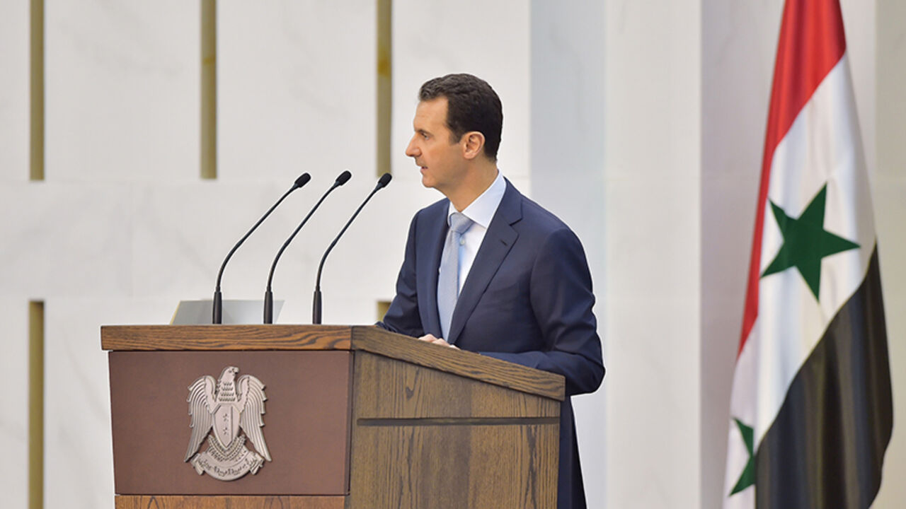 MIDEAST-CRISIS-SYRIA Syria's president Bashar al-Assad speaks during his meeting with the heads and members of public organizations and professional associations in Damascus, Syria, in this handout released by Syria's national news agency SANA on July 26, 2015. Syrian President Bashar al-Assad said on Sunday the army had been forced to give up areas in order to hold onto more important ones in its fight with insurgents, and the scale of the war meant the military faced a manpower shortage. REUTERS/SANA/Handout via Reuters
ATT