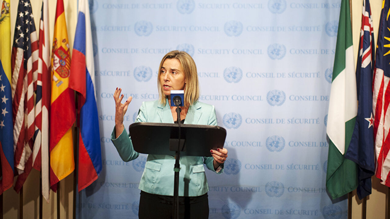 UN-ASSEMBLY/ European Union Foreign Policy Chief Federica Mogherini speaks during a news conference in front of flags representing the countries of the United Nations Security Council at the United Nations headquarters in Manhattan, New York September 30, 2015. REUTERS/Darren Ornitz - RTS2IDJ