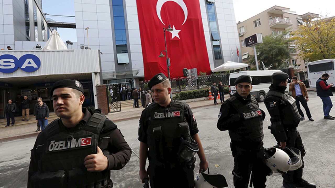 TURKEY-POLITICS/GULEN Riot police stand guard outside the Kanalturk and Bugun TV building in Istanbul, Turkey, October 28, 2015. Turkish police on Wednesday stormed the offices of an opposition media company, days before an election, in a crackdown on companies linked to a U.S.-based cleric and foe of President Tayyip Erdogan, live footage showed. Brawls broke out and police sprayed water cannon to disperse dozens of people in front of the offices of Kanalturk and Bugun TV in Istanbul, a live broadcast on Bugun's website showed.