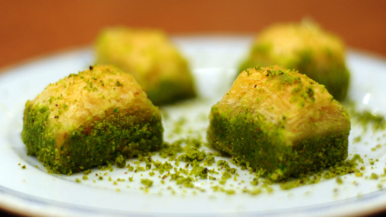 Par7747864 Baklava pastries are seen at a pastry shop on December 19, 2013 in Istanbul. While Turkey has vainly clamoured for years to join the European Union, a sweet pastry made in the country's southeast tasted more success on December 19, winning the EU's prized "protected status". The Gaziantep baklava, described as a "pastry made of layers of filo pastry filled with semolina cream and Antep pistachio", became the first Turkish product to receive the coveted status. AFP PHOTO/ OZAN KOSE (Photo credit shou