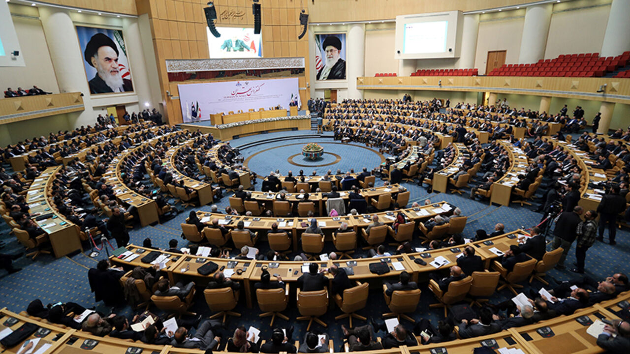 Participants listen to Iranian Oil Minister Bijan Namdar Zanganeh speech during the "Tehran Summit" in the Iranian capital on November 28, 2015. The aim of the summit is to strengthen Iran's international ties in regional and global domains and to attract economic cooperation in competitive global markets through using large share of Iran in petroleum and gas global reserves. AFP PHOTO / ATTA KENARE / AFP / ATTA KENARE        (Photo credit should read ATTA KENARE/AFP/Getty Images)