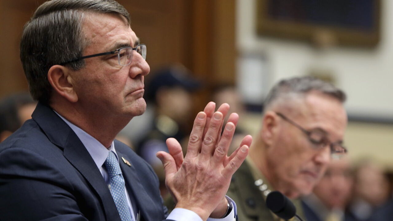 MIDEAST-CRISIS/USA U.S. Defense Secretary Ash Carter (L) and Joint Chiefs Chairman Marine Corps Gen. Joseph Dunford Jr., testify before a House Armed Services Committee hearing on "U.S. Strategy for Syria and Iraq and its Implications for the Region." in Washington December 1, 2015. REUTERS/Gary Cameron - RTX1WOT9