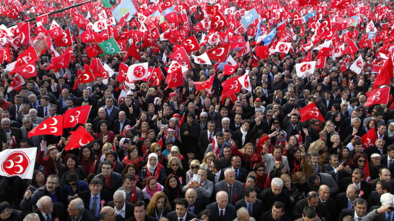 TURKEY/ Supporters of the Nationalist Movement Party (MHP) make the grey wolf sign of the party as they wait for the arrival of party leader Devlet Bahceli during a rally in Istanbul October 5, 2013. REUTERS/Osman Orsal (TURKEY - Tags: POLITICS) - RTR3FMJT