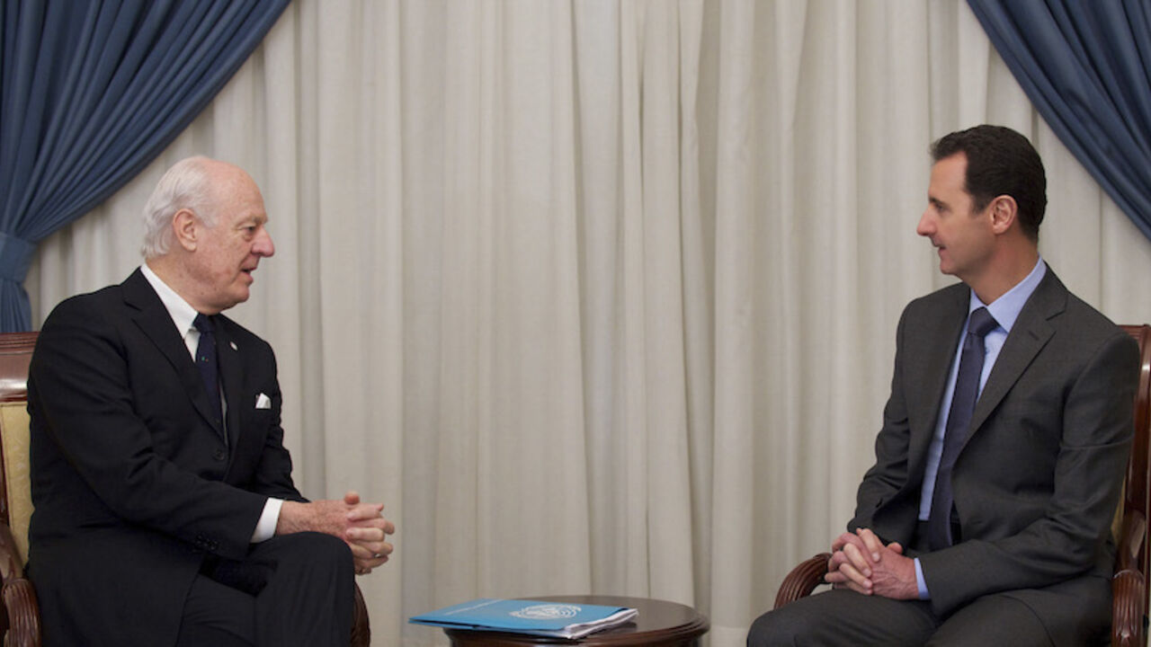 MIDEAST-CRISIS/SYRIA Syria's President Bashar al-Assad (R) meets United Nations Syria mediator Staffan de Mistura, in Damascus February 11, 2015, in this picture released by Syria's national news agency SANA. REUTERS/SANA/Handout via Reuters (SYRIA - Tags: POLITICS CONFLICT CIVIL UNREST)
ATTENTION EDITORS - THIS PICTURE WAS PROVIDED BY A THIRD PARTY. REUTERS IS UNABLE TO INDEPENDENTLY VERIFY THE AUTHENTICITY, CONTENT, LOCATION OR DATE OF THIS IMAGE. FOR EDITORIAL USE ONLY. NOT FOR SALE FOR MARKETING OR ADVERTISING CAMPAIGNS.
