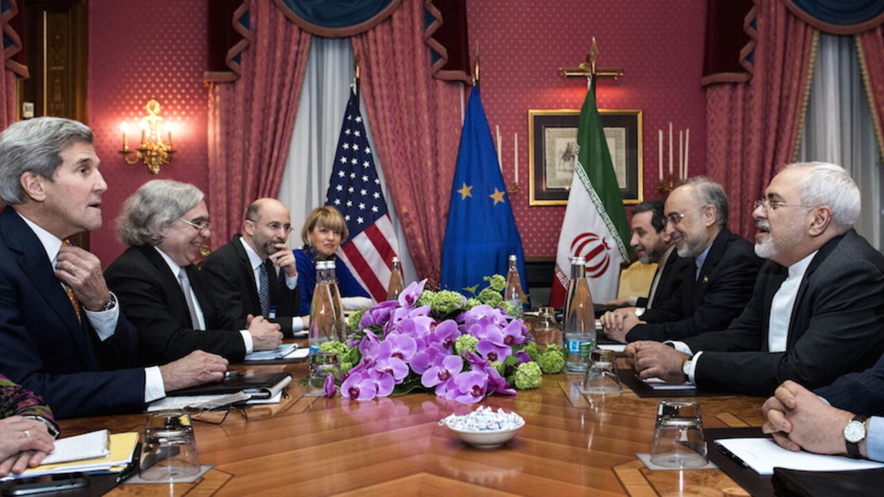 IRAN-NUCLEAR/ U.S. Secretary of State John Kerry (L), U.S. Secretary of Energy Ernest Moniz (2nd L), Head of the Iranian Atomic Energy Organisation Ali Akbar Salehi (2nd R) and Iranian Foreign Minister Javad Zarif (R) wait with others ahead of a meeting at the Beau Rivage Palace Hotel in Lausanne on March 26, 2015 during negotiations on the Iranian nuclear programme. REUTERS/Brendan Smialowski/Pool - RTR4UXKJ