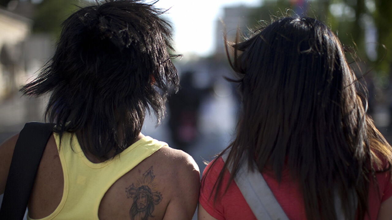 Members of the Israeli transgender community march during the annual Gay parade in Jerusalem on June 25, 2009. More than 2,000 people took part a toned down Gay Pride parade in Jerusalem which drew only muted protest, in contrast to the violent controversy the event had stirred in the past.  AFP PHOTO/MARCO LONGARI (Photo credit should read MARCO LONGARI/AFP/Getty Images)