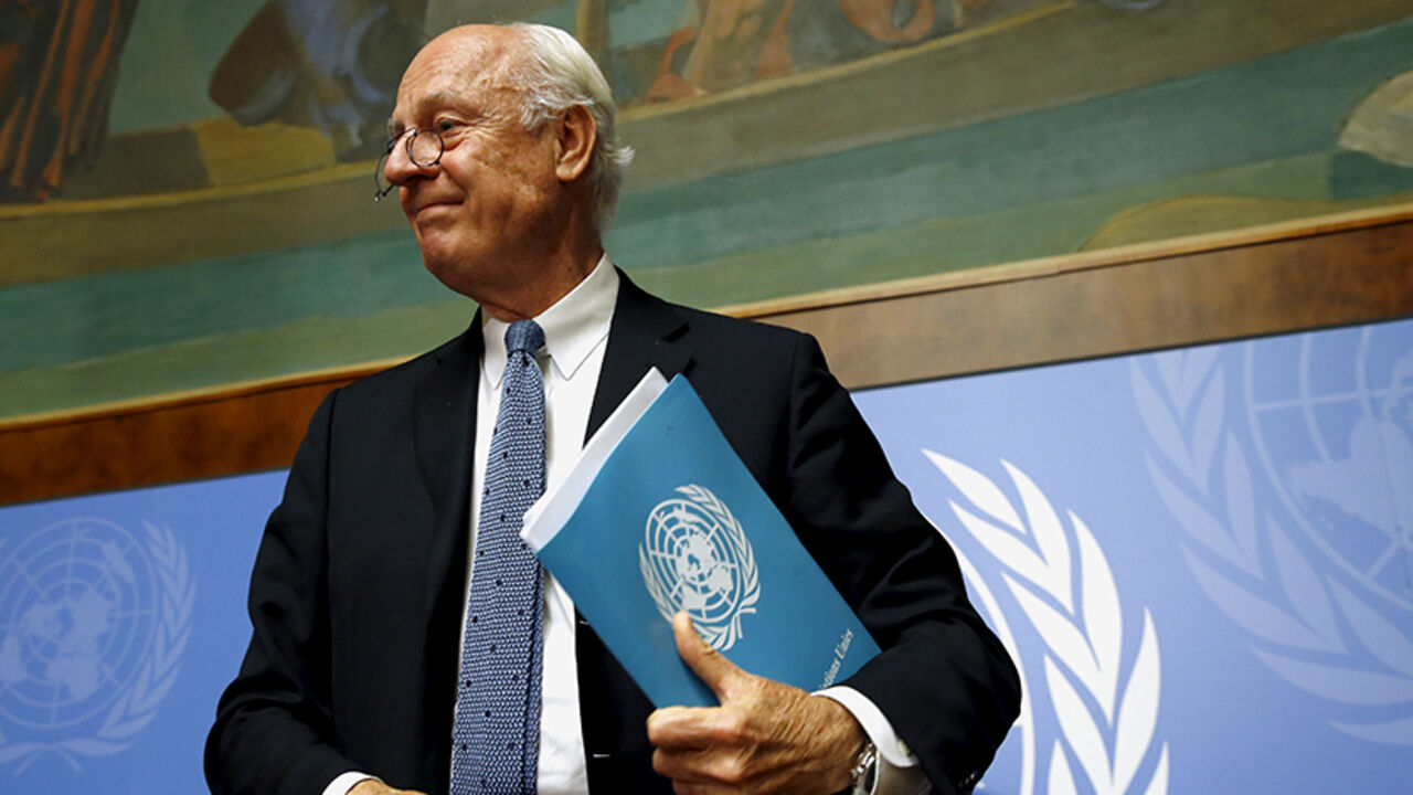 MIDEAST-CRISIS/SYRIA-UN United Nations Special Envoy for Syria, Staffan de Mistura leaves after a news conference on the latest developments in Syria at the United Nations European headquarters in Geneva, Switzerland, October 12, 2015. The U.N. diplomat trying to convene talks to end the war in Syria said he first hopes to get an understanding between Russia and the United States, which will each then form the core of one or more "contact groups" of interested countries supporting the talks. U.N. envoy Staffan de Mistura told a