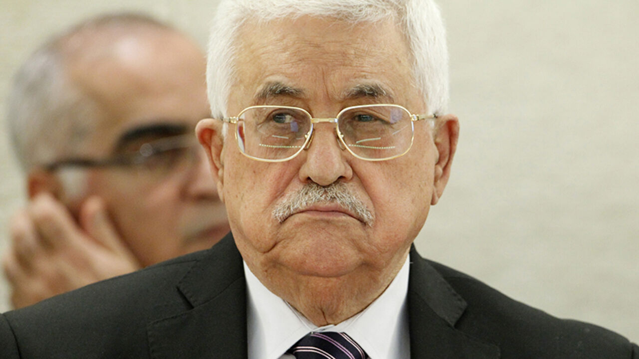 UN-RIGHTS/ Palestinian President Mahmoud Abbas looks on as he addresses the special meeting of Human Rights Council at the United Nations European headquarters in Geneva, Switzerland October 28, 2015. REUTERS/Pierre Albouy - RTX1TLPI
