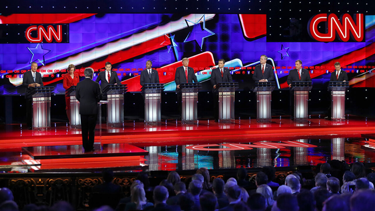 USA-ELECTION/ Republican U.S. presidential candidates (L-R) Governor John Kasich, former HP CEO Carly Fiorina, Senator Marco Rubio, Dr. Ben Carson, businessman Donald Trump, Senator Ted Cruz, former Governor Jeb Bush, Governor Chris Christie and Senator Rand Paul participate in the Republican presidential debate in Las Vegas, Nevada December 15, 2015. REUTERS/Mike Blake - RTX1YVDC