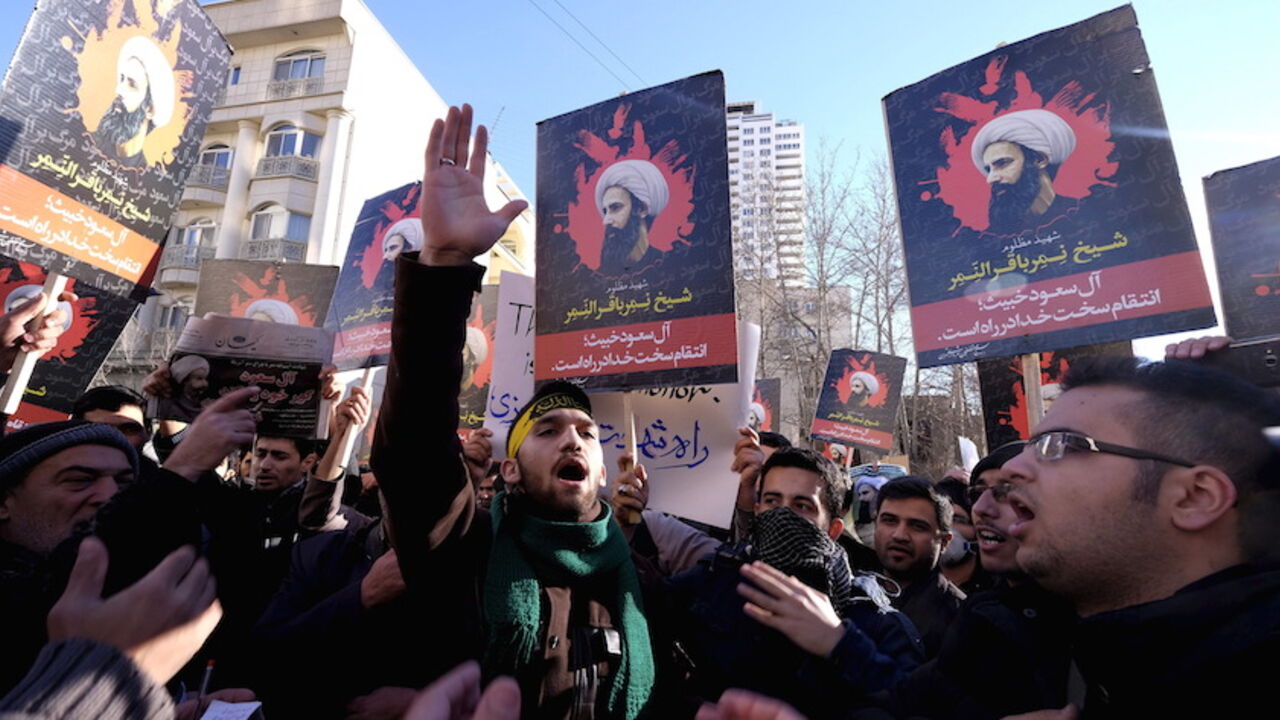 SAUDI-SECURITY/IRAN Iranian protesters chant slogans as they hold pictures of Shi'ite cleric Sheikh Nimr al-Nimr during a demonstration against the execution of Nimr in Saudi Arabia, outside the Saudi Arabian Embassy in Tehran January, 3, 2016. REUTERS/Raheb Homavandi/TIMA ATTENTION EDITORS - THIS IMAGE WAS PROVIDED BY A THIRD PARTY. FOR EDITORIAL USE ONLY. - RTX20VH0