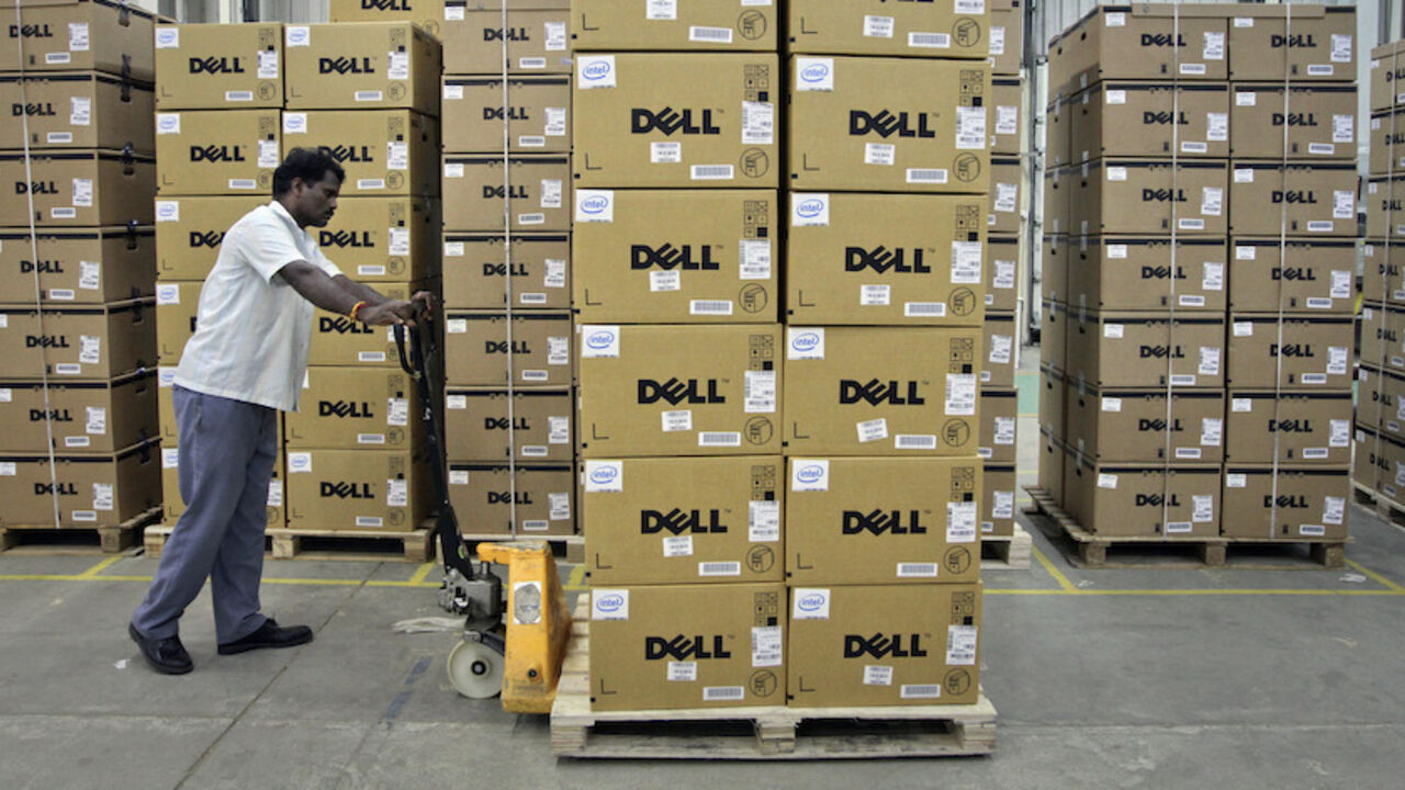 A man pushes a trolley full of Dell computers through a company factory in Sriperumbudur Taluk, in the Kancheepuram district of the southern Indian state of Tamil Nadu, in this June 2, 2011 file photograph. Dell Inc's shares fell 9 percent on August 17, 2011, a day after weak technology spending forced the world's second-largest PC maker to slash its full-year revenue forecast.        REUTERS/Babu/Files     (INDIA - Tags: BUSINESS) - RTR2Q1AT