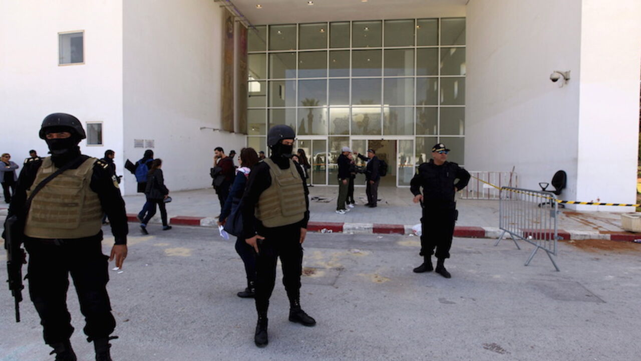 TUNISIA Tunisian police officers guard the entrance of the National Bardo Museum in Tunis March 19, 2015. Tunisia said it would deploy the army to major cities and arrested four people on Thursday after militant gunmen killed 20 foreign tourists visiting the national Bardo museum, the worst attack on the north African country in more than a decade. REUTERS/Anis Mili - RTR4U1T3