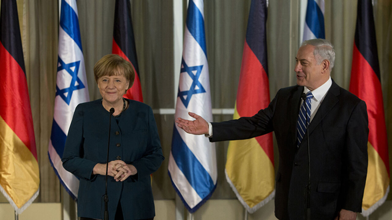 ISRAEL/ Israeli Prime Minister Benjamin Netanyahu speaks to the press during his meeting with German Chancellor Angela Merkel at the Prime minister's residence in Jerusalem February 24, 2014. REUTERS/Sebastian Scheiner/Pool (JERUSALEM - Tags: POLITICS) - RTX19EWH