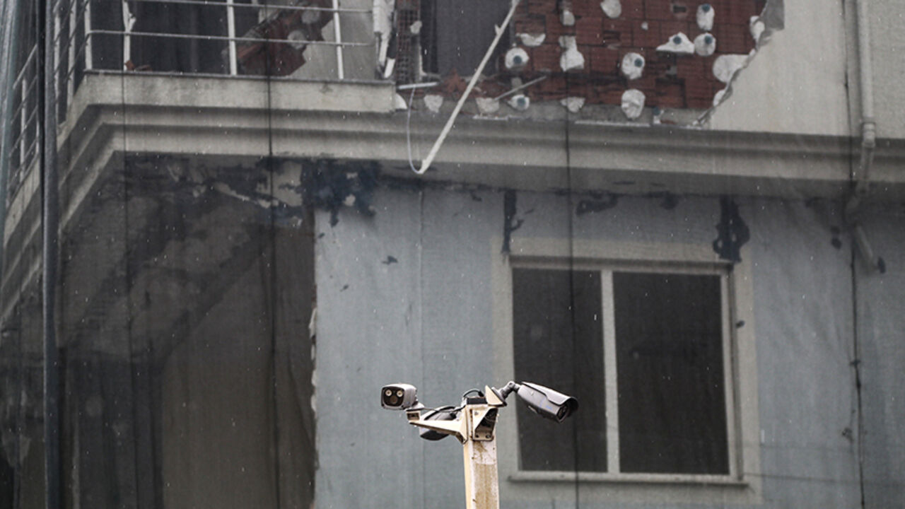 TURKEY-ATTACKS/ Surveillance cameras are seen in front of a police station after an attack in Istanbul, Turkey, August 10, 2015. Overnight, a vehicle laden with explosives was used in the attack on the police station in the Istanbul district of Sultanbeyli at around 01:00 on Monday (2200 GMT on Sunday), injuring three police officers and seven civilians, police said. REUTERS/Huseyin Aldemir - RTX1NRNQ