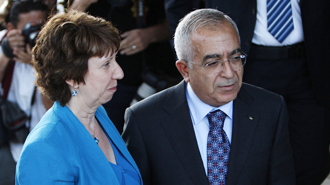 PALESTINIANS-ISRAEL/ Palestinian Prime Minister Salam Fayyad (R) greets European Union High Representative for Foreign Affairs and Security Policy Catherine Ashton upon her arrival for their meeting in the West Bank city of Ramallah July 17, 2010.
REUTERS/Mohamad Torokman (WEST BANK - Tags: POLITICS) - RTR2GHYN