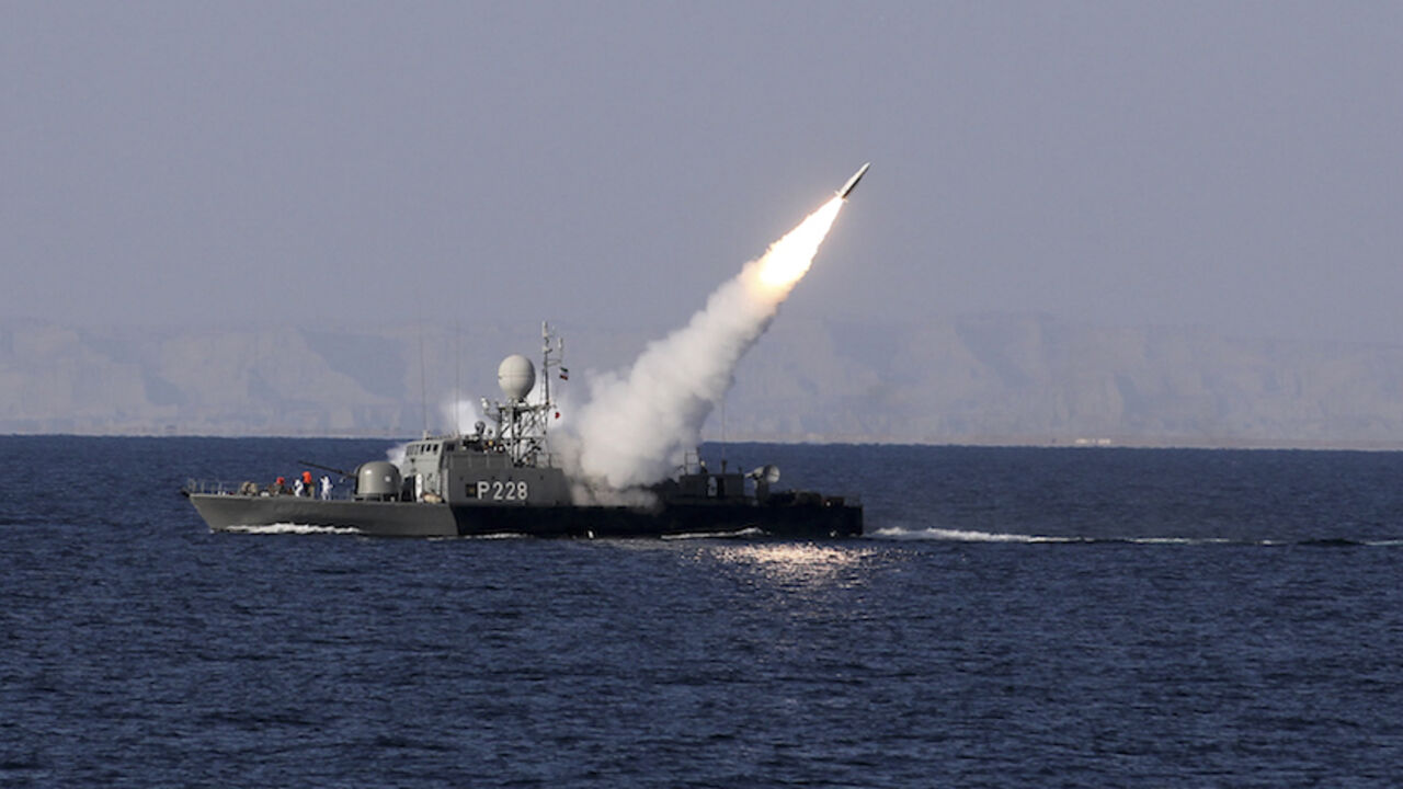 IRAN-MISSILE/ A new medium-range missile is fired from a naval ship during Velayat-90 war game on Sea of Oman near the Strait of Hormuz in southern Iran January 1, 2012. Iran test-fired a new medium-range missile, designed to evade radars, on Sunday during the last days of its naval drill in the Gulf, the official IRNA news agency quoted a military official as saying. REUTERS/Jamejamonline/Ebrahim Norouzi (IRAN - Tags: POLITICS MILITARY TPX IMAGES OF THE DAY) THIS IMAGE HAS BEEN SUPPLIED BY A THIRD PARTY. IT IS DISTRIBUT