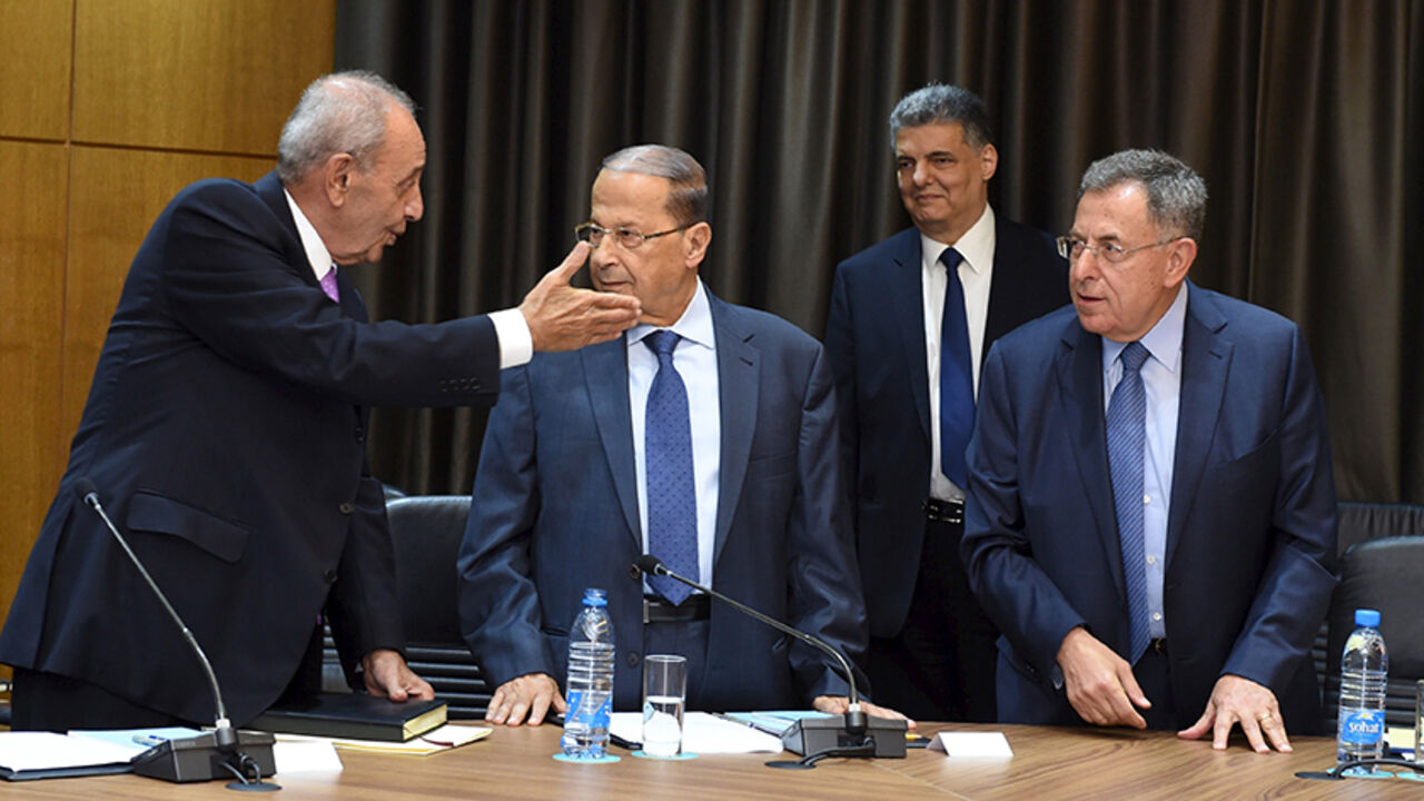 MIDEAST-CRISIS/LEBANON Lebanese Parliament Speaker Nabih Berri (L) speaks with Lebanese Christian leader Michel Aoun (C) and former Prime Minister Fouad Siniora (R) during a session of national dialogue aimed at discussing ways out of a political crisis in downtown Beirut, Lebanon, September 9, 2015. Lebanese security services locked down central Beirut on Wednesday as politicians gathered to discuss ways out of a political crisis that has paralyzed government and fueled a wave of street protests. REUTERS/Hasan Ibrahim/Lebanese P