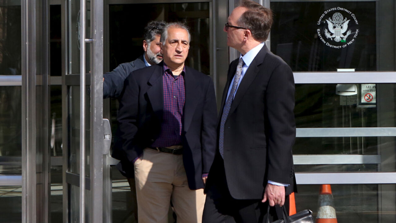 IRAN-UN/CHARGES Ahmad Sheikhzadeh (C), a consultant to the Iranian mission to the United Nation, leaves Brooklyn Federal Court in New York, March 23, 2016. Sheikhzadeh, 60, is accused of charges related to sanctions violations, money laundering and tax matters, his lawyer Steve Zissou said at the hearing. REUTERS/Pearl Gabel - RTSBYWL